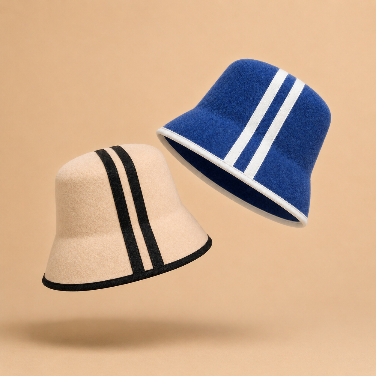 Saunelle merino sauna hats in Dune and Nocturne colourways shown in motion