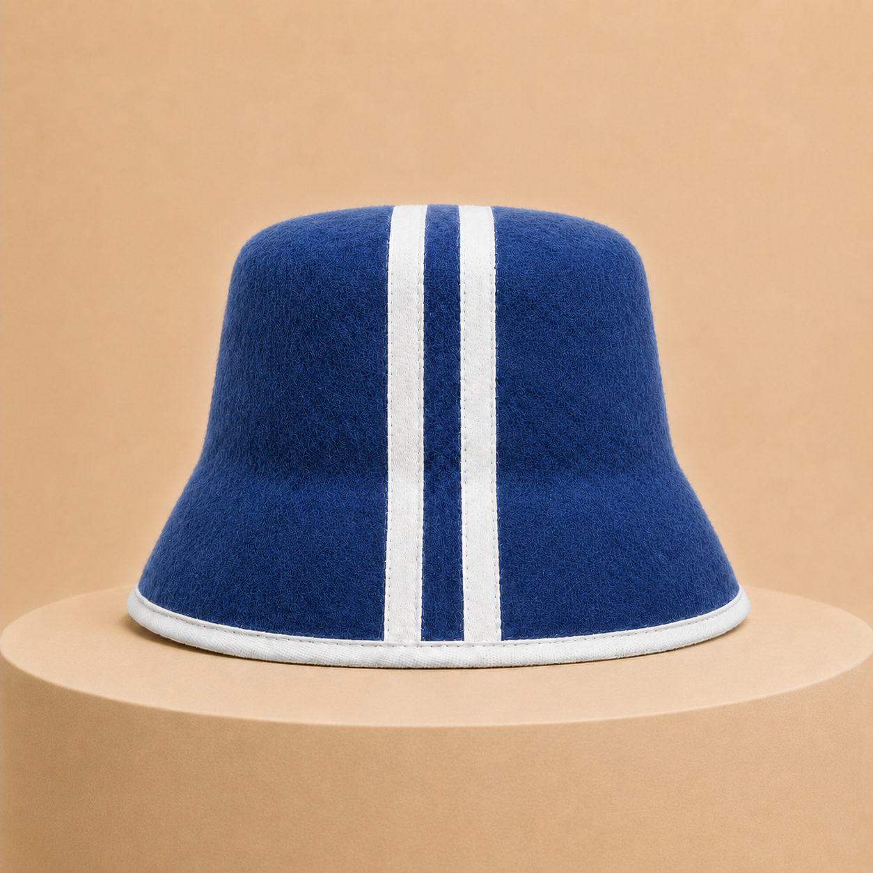 Saunelle Nocturne navy merino wool sauna hat with white double stripe and contrast brim